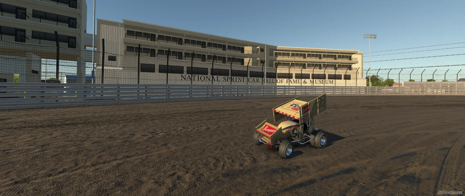 Coors Banquet 410 winged sprint car on a dirt oval